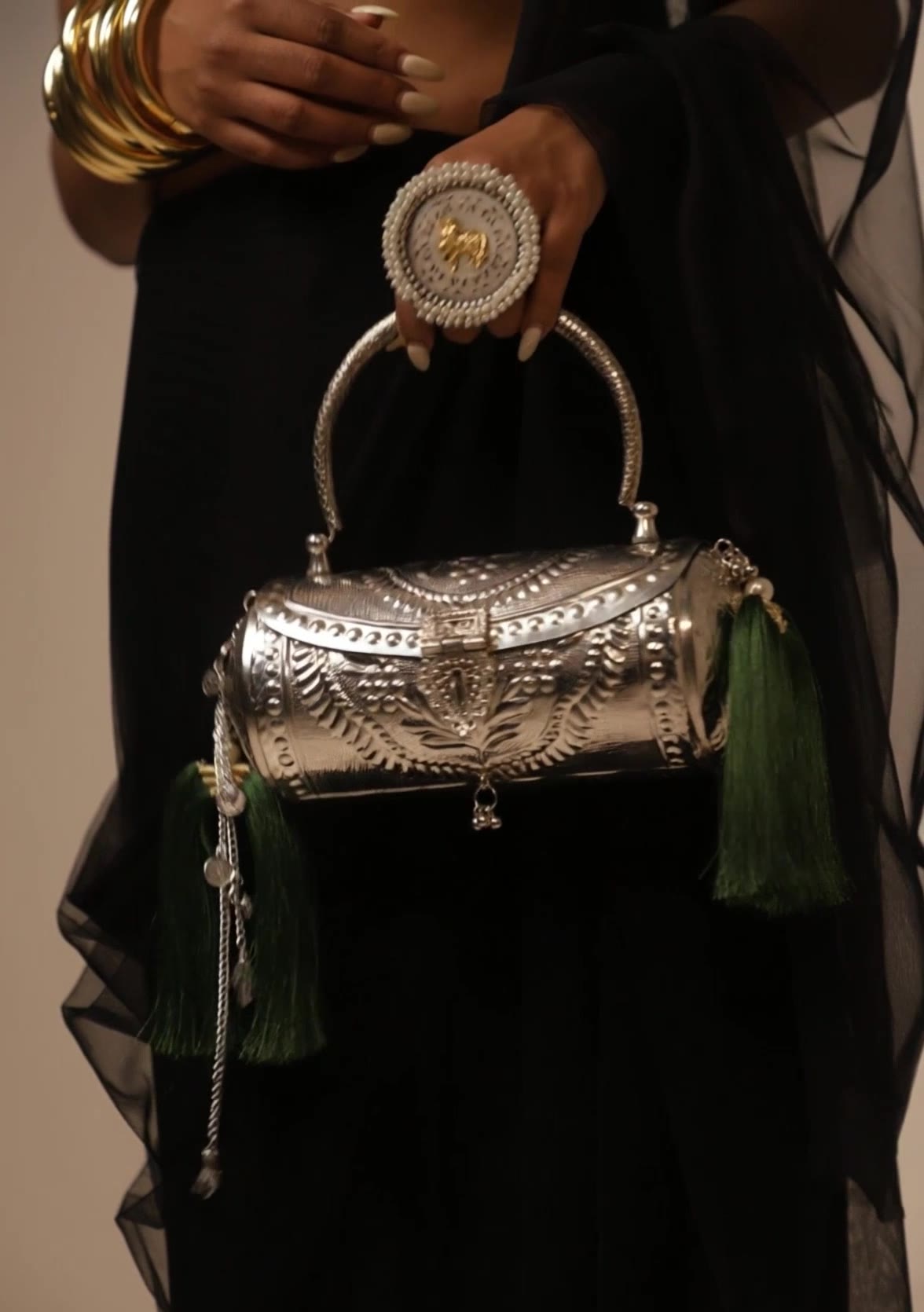 Emerald Heirloom silver barrel clutch with emerald-green tassels, video preview
